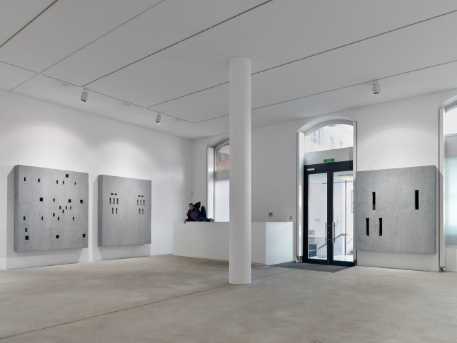 Installation view of wall works by Valentin Carron