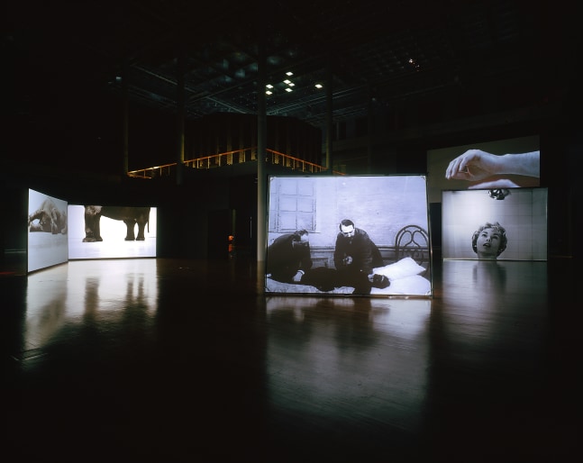 Installation view of video works by Douglas Gordon