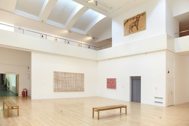 Installation view of works by Tim Rollins and K.O.S.