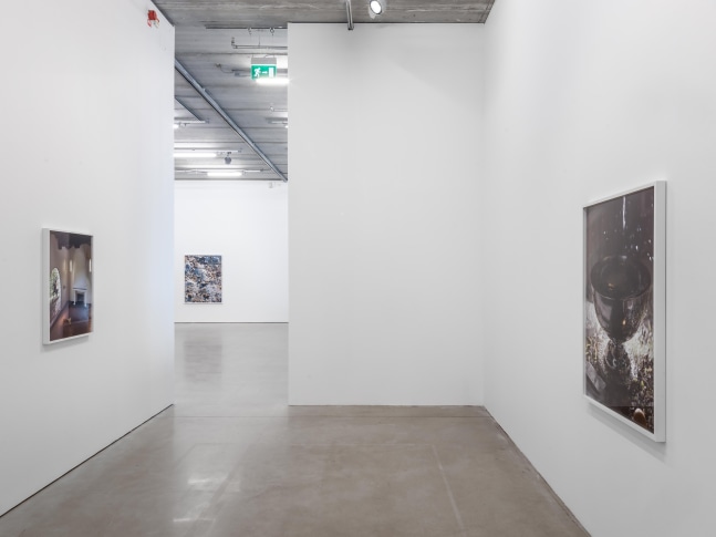 Installation view of photographs by Torbjørn Rødland