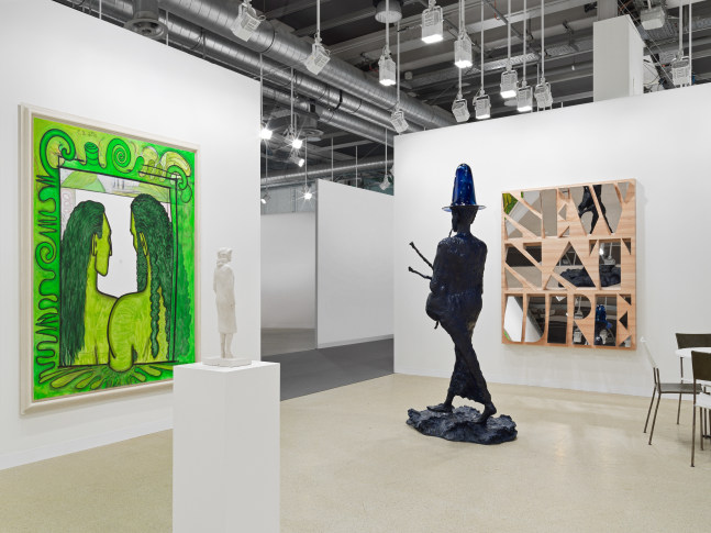 installation view of works by various artists at the Art Basel booth