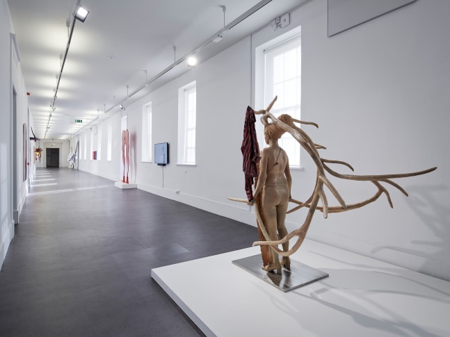 Installation view of painting by Tschabalala Self