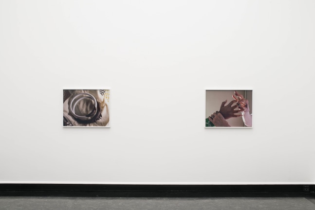 Installation view of photographs by Torbjørn Rødland