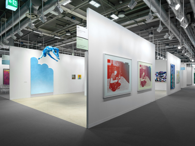 installation view of paintings and sculptures by various artists