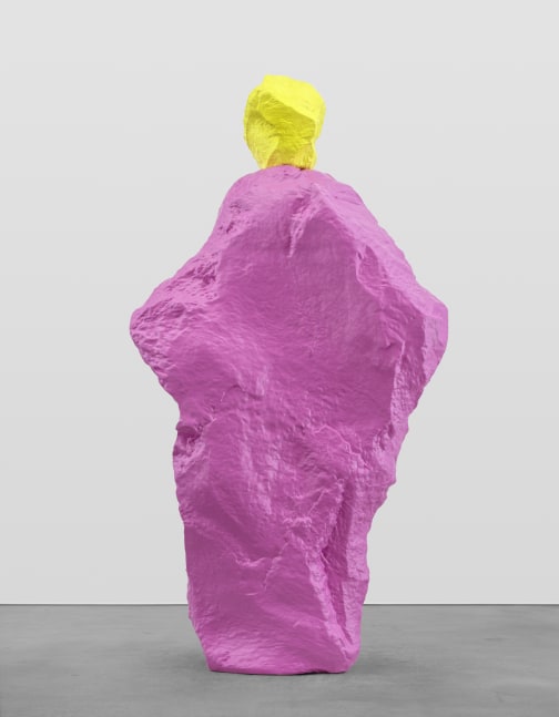 pink sculpture with yellow head by Ugo Rondinone