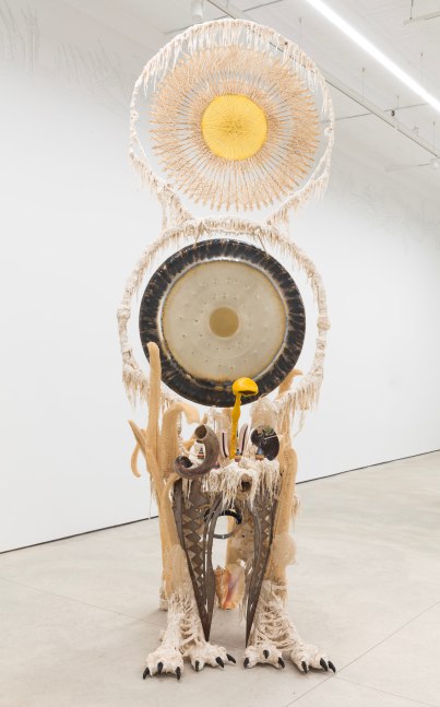Guadalupe Maravilla
Disease Thrower #7, 2019
gong, steel, wood, cotton, glue mixture, plastic, loofah, and objects collected from a ritual of retracing the artist&amp;#39;s original migration route
144 x 56 x 63 ins.
365.8 x 142.2 x 160 cm