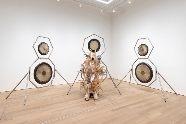 Guadalupe Maravilla
Disease Thrower #17, 2021
gong, steel, wood, cotton, glue mixture, plastic, loofah, and objects collected from a ritual of retracing the artist&amp;#39;s original migration route
99 x 96 x 55 ins.
251.5 x 154.9 x 139.7 cm