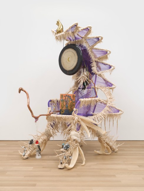 Guadalupe Maravilla
El Brujo Disease Thrower, 2024
steel gong, cotton, glue mixture, plastic, loofah, oil on tin, and objects collected from a ritual of retracing the artist&amp;#39;s original migration route
100 x 80 x 60 ins.
254 x 203.2 x 152.4 cm
