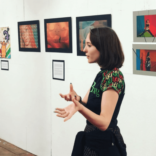 Onteora High School student discussing her artwork inspired by Al Held
