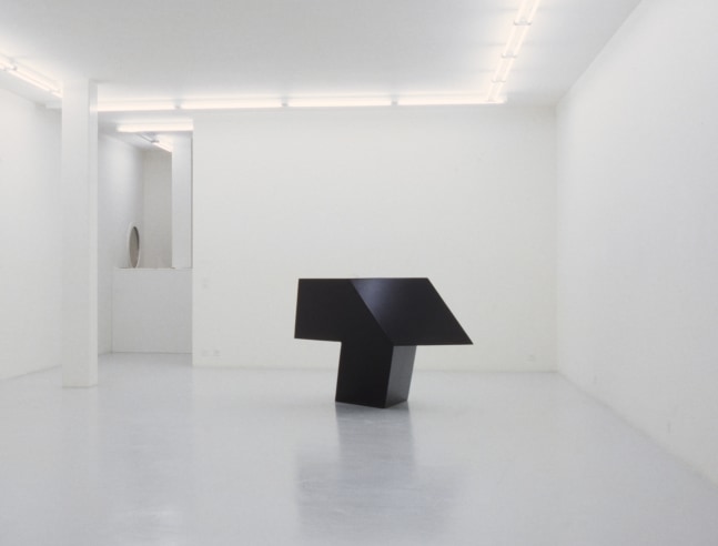 Aluminum, painted black
45 &amp;times; 70 &amp;times; 423&amp;frasl;4 in. (114.3 &amp;times; 177.8 &amp;times; 108.6 cm), edition 4/6
Tony Smith: Sculptures and Paintings. Art &amp;amp; Public, Geneva, Switzerland, 1995
Photo: Ilmari Kalkkinen