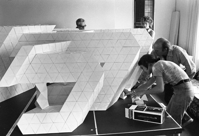 Tony Smith, Jane Livingston, and assistants with 3rd model at Chateau Marmont, Los Angeles, ca. 1970
&amp;nbsp;