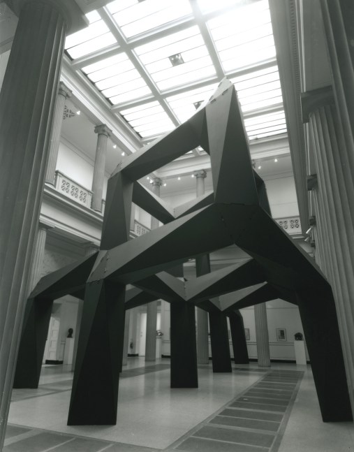 Plywood, painted black
24 &amp;times; 48 &amp;times; 34 ft. (7.32 &amp;times; 14.63 &amp;times; 10.36 m)
Scale as Content: Ronald Bladen, Barnett Newman, Tony Smith. Corcoran Gallery of Art, Washington, DC, 1967