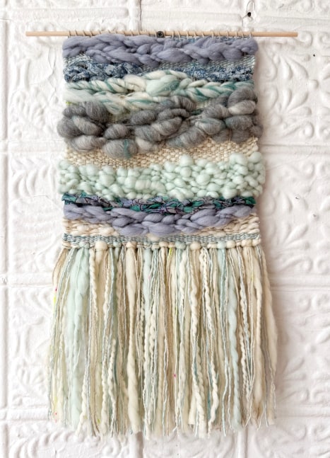 weaving in wool and cotton in creams and blues