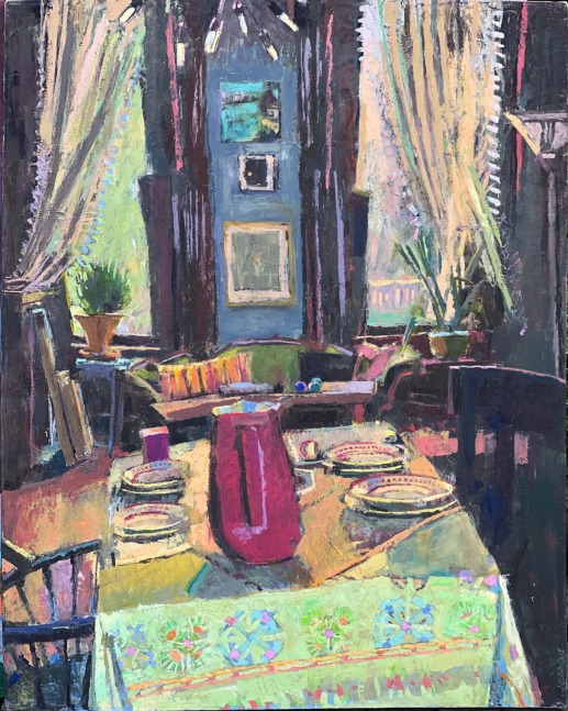 interior, at an angle, with windows in the background and a table with a lime green tablecloth and a red vase on it
