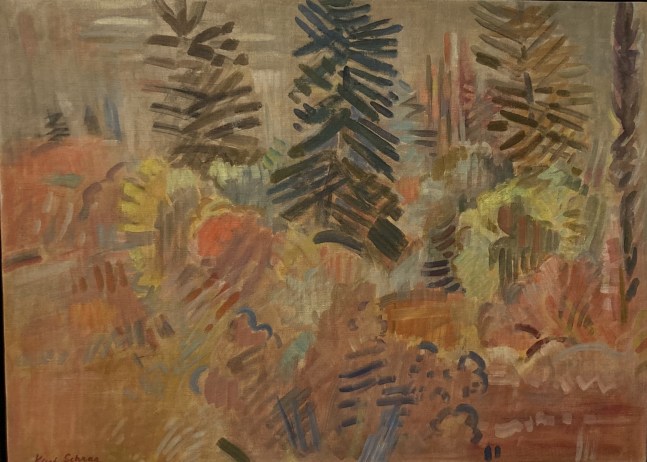 red brown landscape with trees in lack