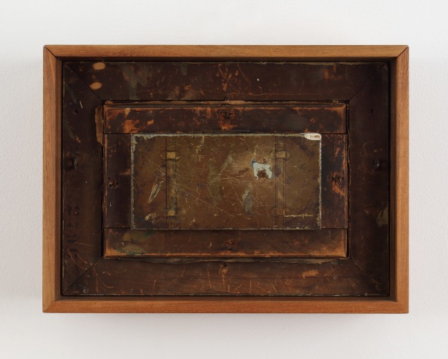 Pieces of wood collaged together in a frame