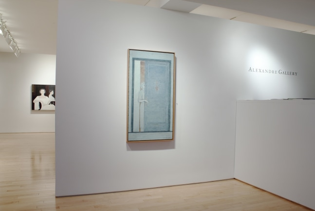 Photograph showing a view of an exhibition space, with one hanging hanging on a white wall