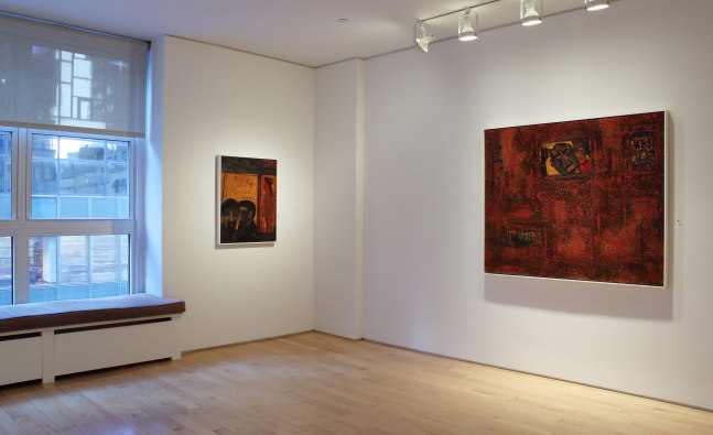 Photograph showing a corner view of an exhibition space, with two paintings hung on white walls