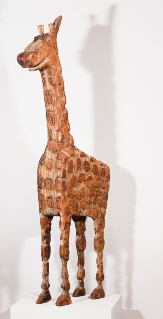 Wood sculpture of a giraffe