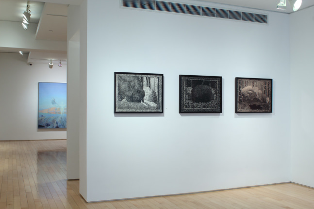 Photograph showing a front view of an exhibition space with three drawings and one painting hanging on white walls