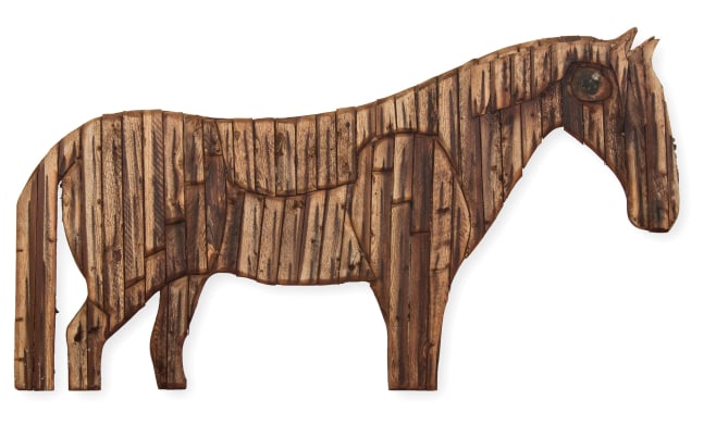 Wall-hanging sculpture of the figure of a horse composed of various pieces of wood