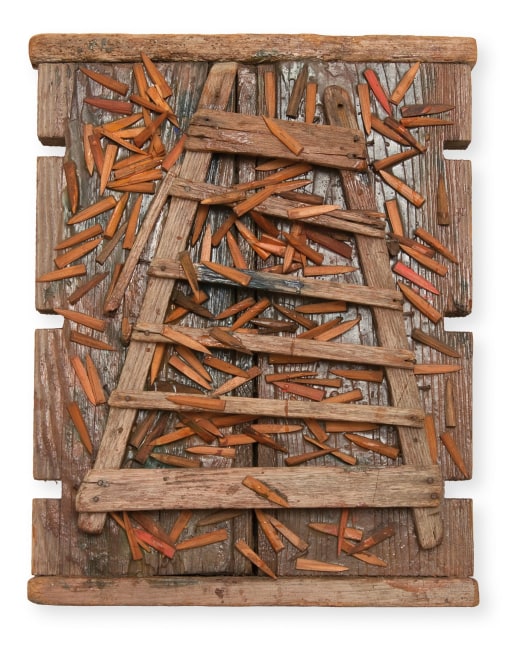 Wall-hanging sculpture composed of various pieces of wood assembled to create a ladder form with smaller, sharp-looking pieces of wood arranged around and on top of the ladder
