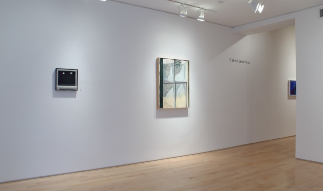 Photograph showing a view of an exhibition space, with three paintings hanging on a white wall
