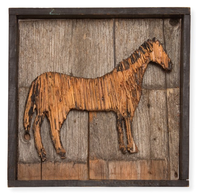 Wall-hanging wood sculpture of an abstracted horse