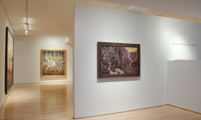 Photograph showing a view of an exhibition with three paintings hanging on white walls