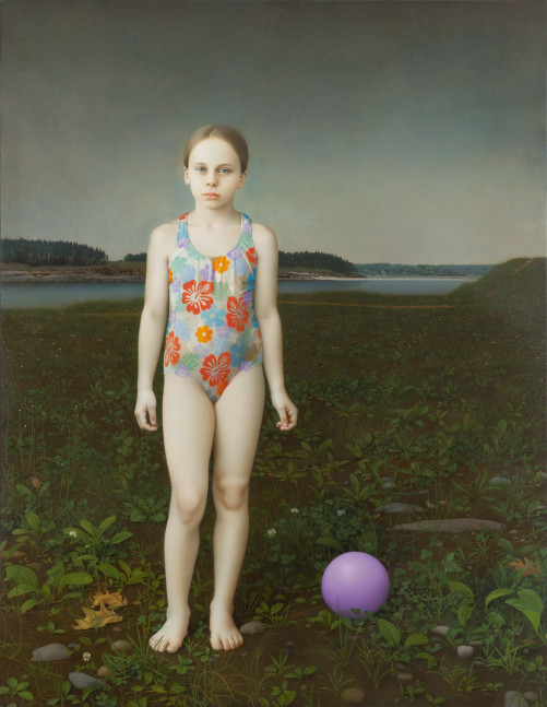 Portrait of a young girl in a flowered bathing suit standing in a dark landscape, with a purple ball on the ground to her left