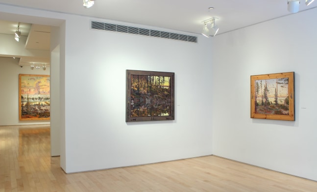Photograph showing a corner view of an exhibition space, with three paintings hanging on white walls