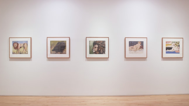 Photograph showing a view of an exhibition space, with five framed paintings hanging on a white wall