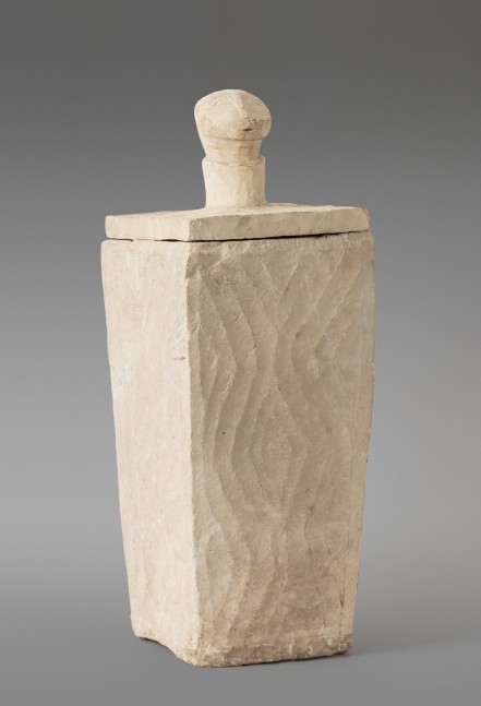 Salangsang Culture, Mindanao, Philippines Carved Limestone Covered Burial Jar, c. 600 A.D. carved limestone ossuary (burial jar) 27 1/2 x 9 1/2 x 9 1/2 inches