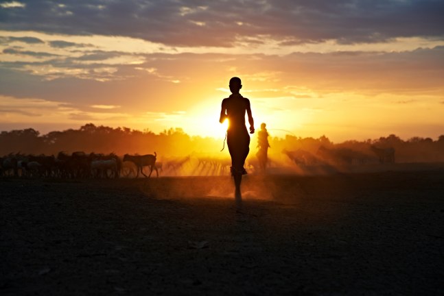 Steve McCurry  Running at Sunset
