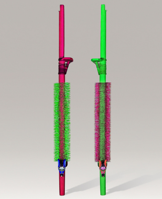 Two neon green and pink stilts decorated with porcupine quills.
