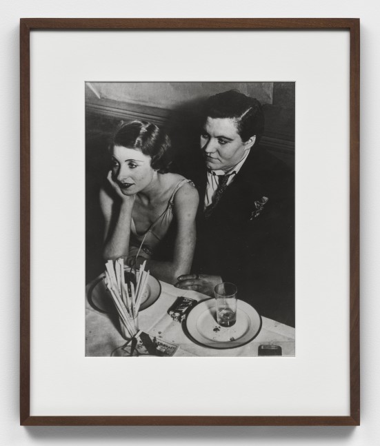 Black and white silver gelatin print of lesbian couple at Le Monocle, Paris.