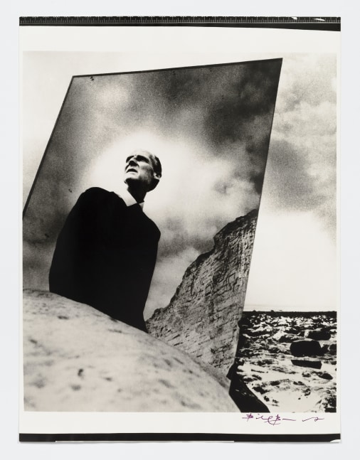 Black and white photographic portrait of Bill Brandt with mirror in nature