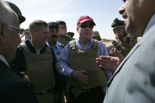 Members of the Haditha City Council greet Senator John McCain in Haditha, Iraq, March 16, 2008 (U.S. Marine Corps photo by Cpl. Erin A. Kirk, Courtesy Images of Freedom)