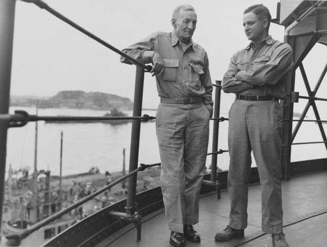 Vice Admiral John S. McCain, USN with his son, Commander John S. McCain, Jr., on board a U.S. Navy ship in Tokyo Bay, circa September 1945, (Courtesy U.S. naval History and Heritage Command)