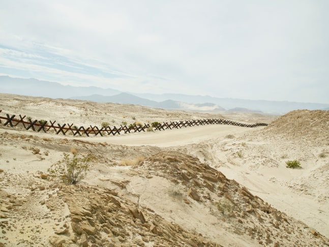 A photograph by Richard Misrach titled, 'Normandy Wall Near Ocotillo, California,' 2015