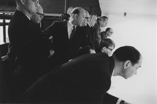 Businessmen at a squash match, Detroit, 1968