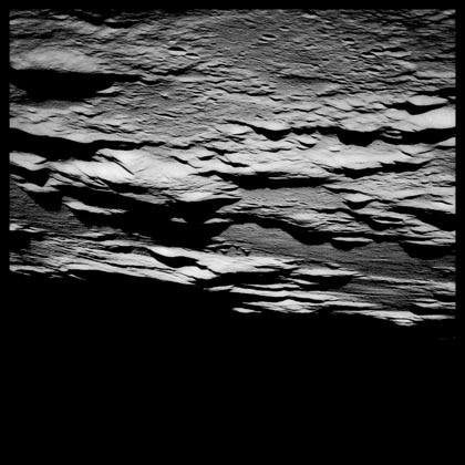 Lunar Highlands and Terminator in Morning Sun, 70 Miles Altitude; Attributed to Michael Collins, Apollo 11, July 16-24, 1969