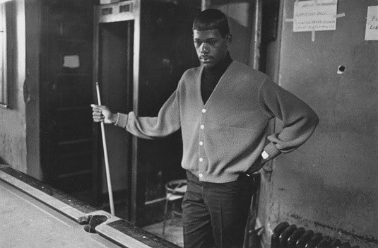 Pool player in an east side poolroom, Detroit, 1968