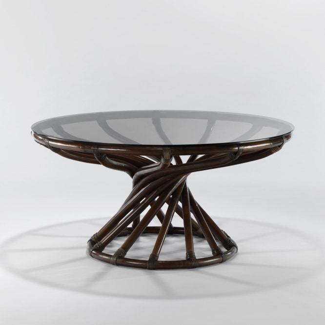 Glass topped rattan low table by Bernard Govin