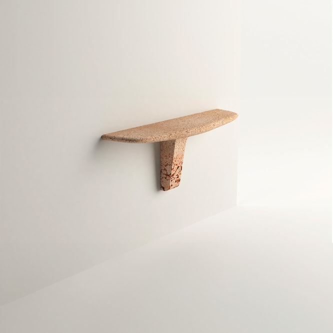 photo of a cork shelf on a wall