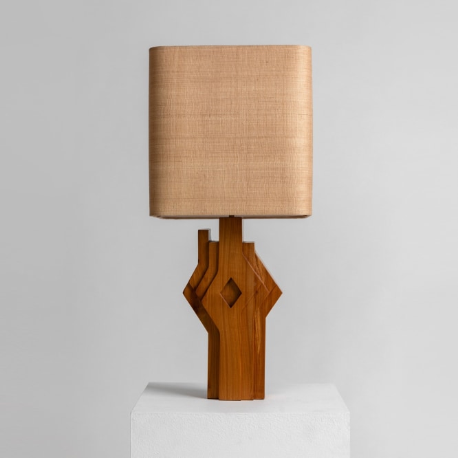 Wood based table lamp with reed shade