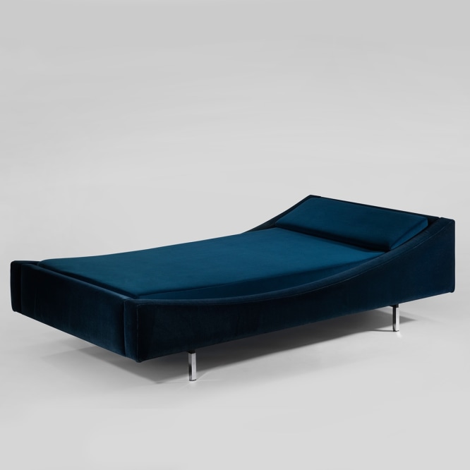 blue bed in an empty room