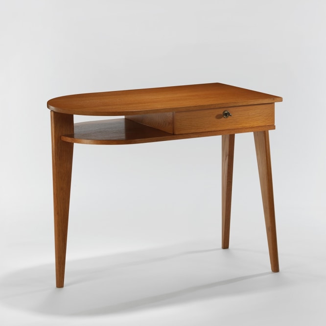 wood desk in an empty room