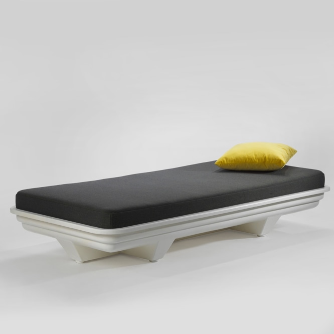 daybed in an empty room