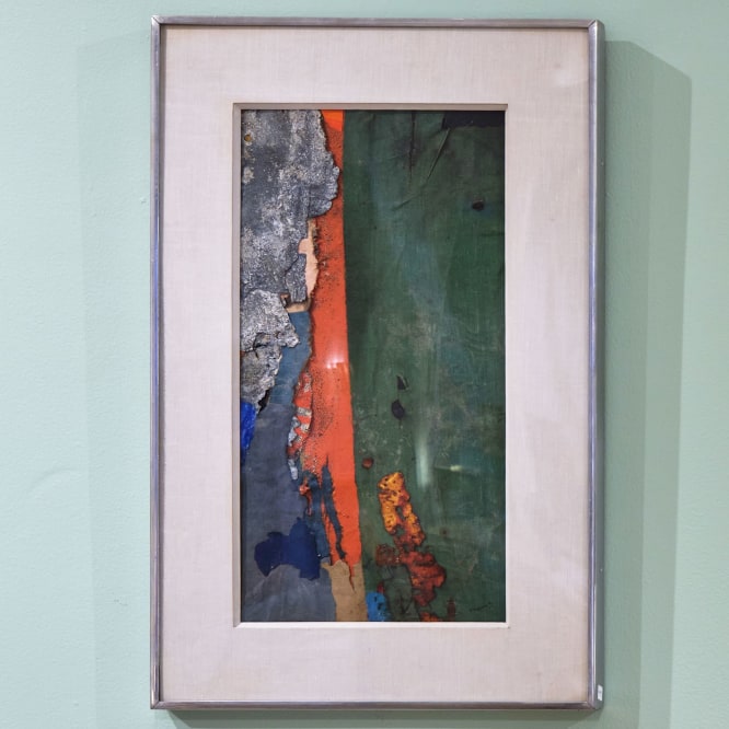 mixed media collage on a wall